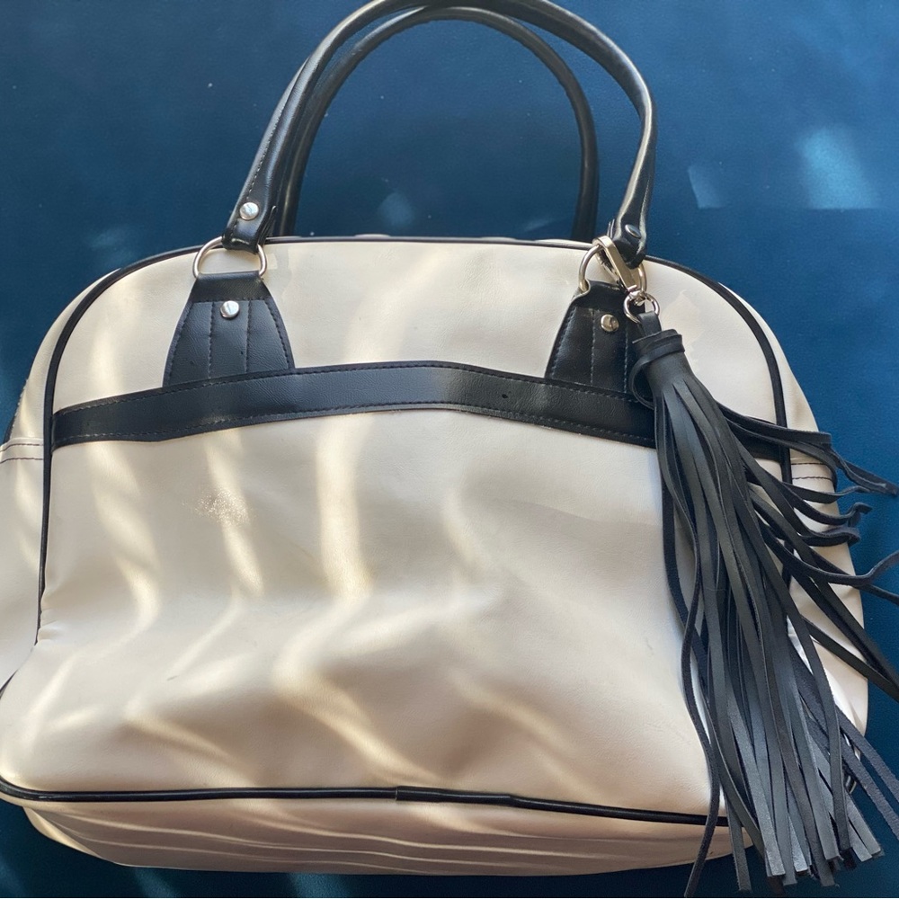 Levi white and black carry on bag